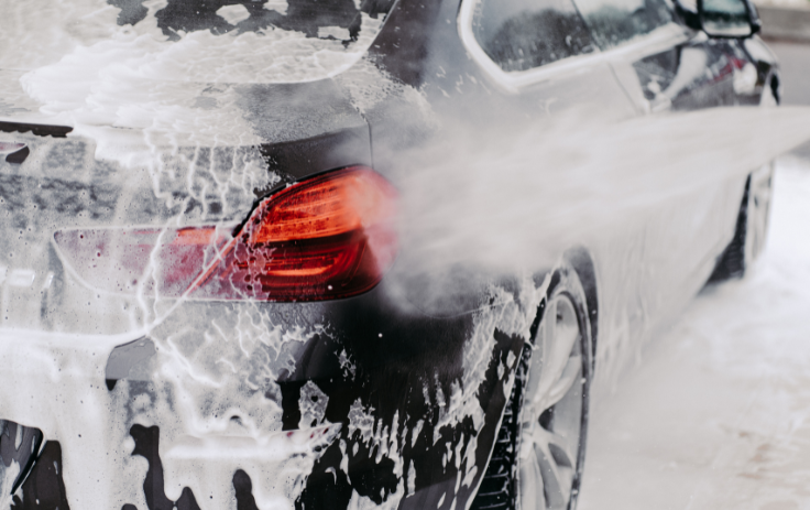 washing a black car